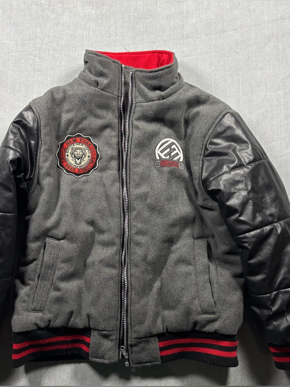 Enyce Grey and Black Puffer Jacket with Red Lining and Trim